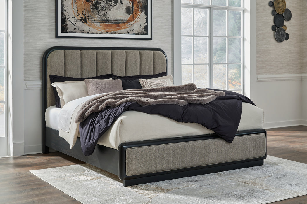 Rowanbeck King Upholstered Panel Bed with Mirrored Dresser and Nightstand